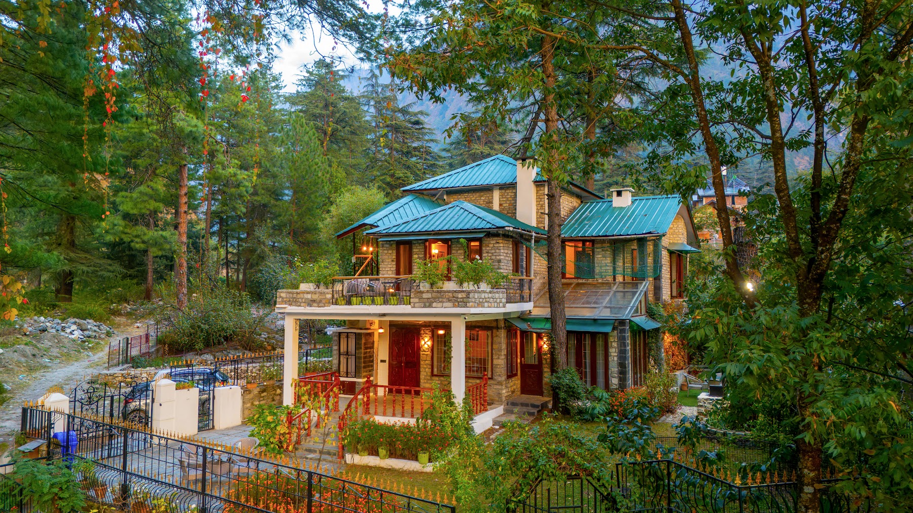 Aerial view of River Stone Villa among the pines