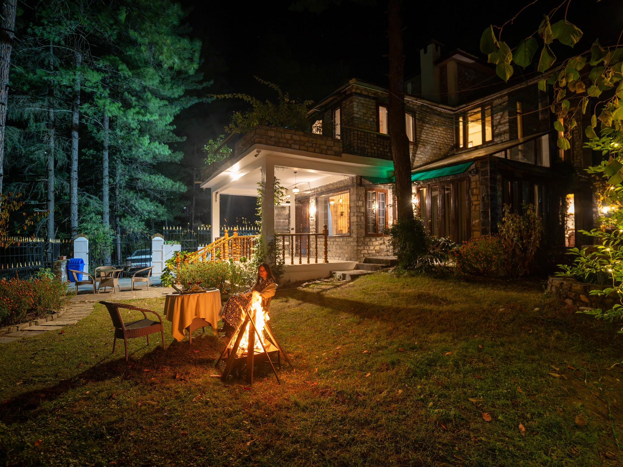 Bonfire in the garden at River Stone Villa at night