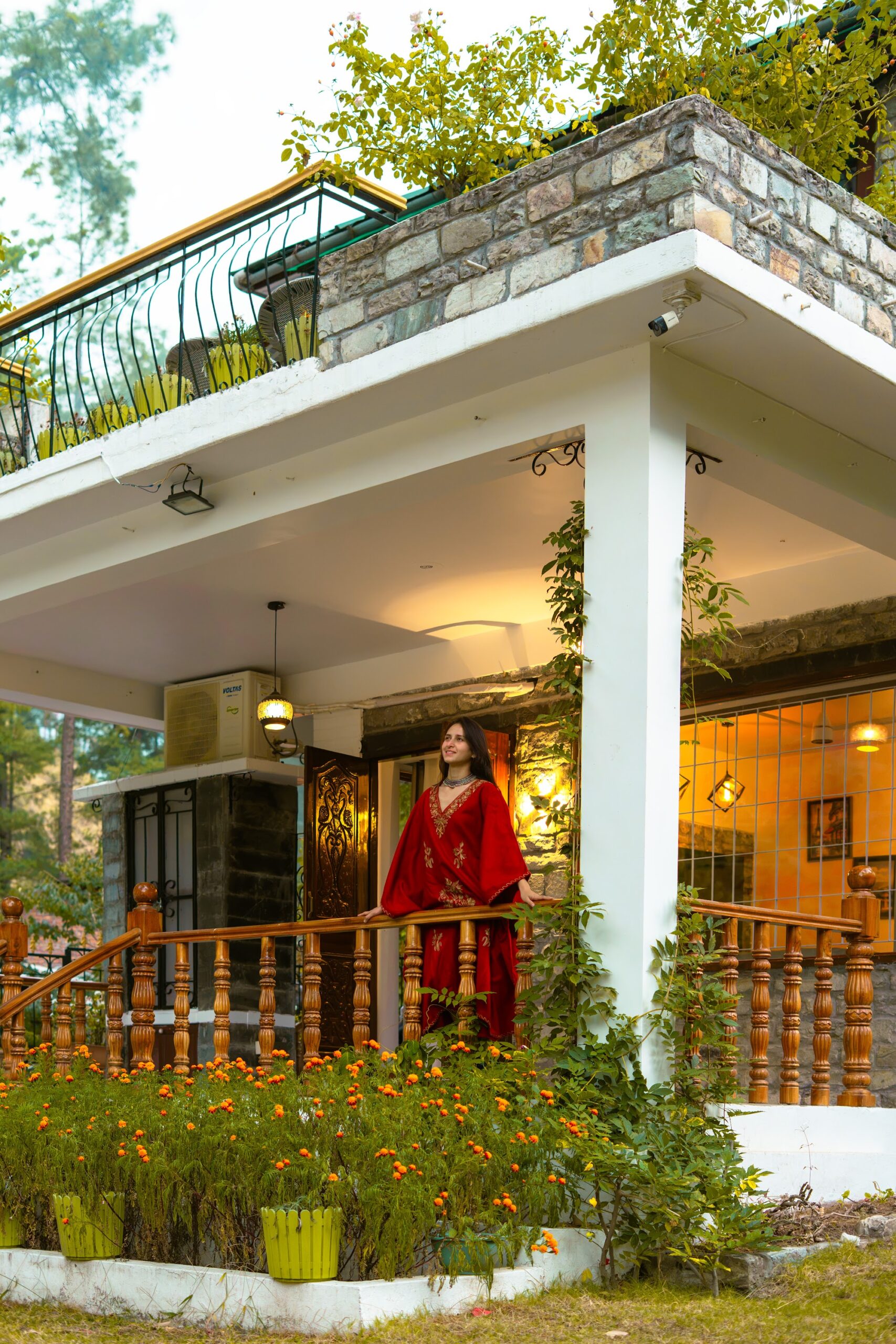 Stone-clad upper balcony of River Stone Villa
